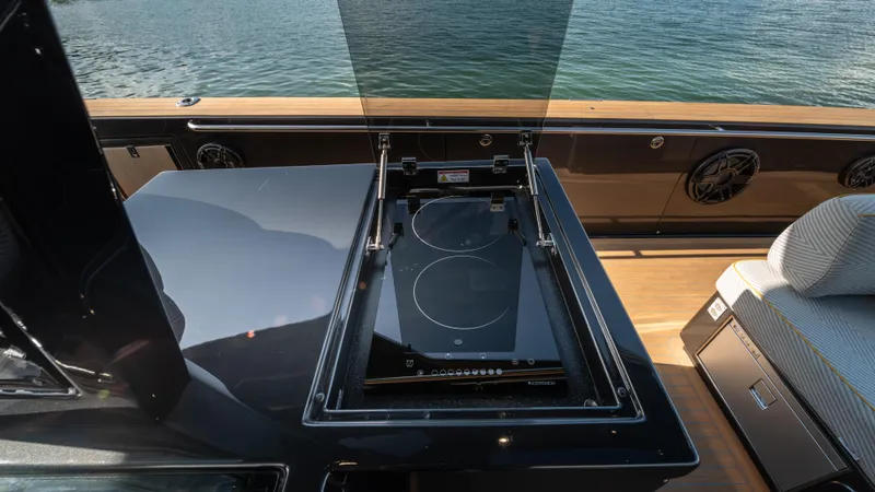 Love$ick Yacht Photos Pics 2023 Pardo Yachts P50 featuring a sleek outdoor induction cooktop on deck.