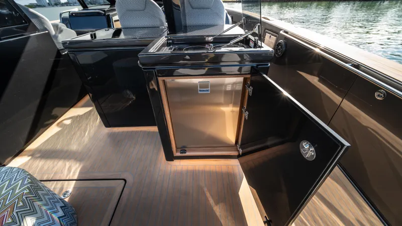 Love$ick Yacht Photos Pics 2023 Pardo Yachts P50 interior with open cabinet and modern design.