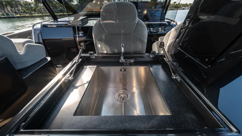 Love$ick Yacht Photos Pics Luxury yacht Pardo P50 2023 interior with sleek sink and modern design.