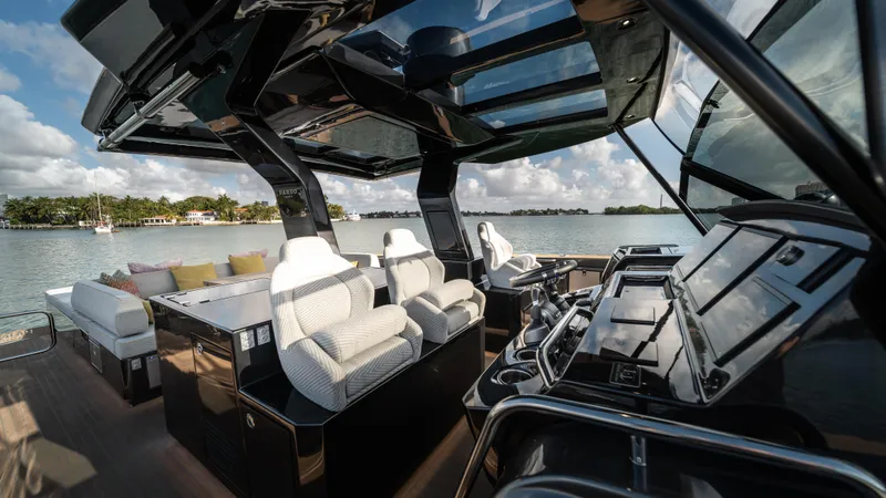 Love$ick Yacht Photos Pics 2023 Pardo Yachts P50 luxury yacht interior with modern seating and navigation controls.