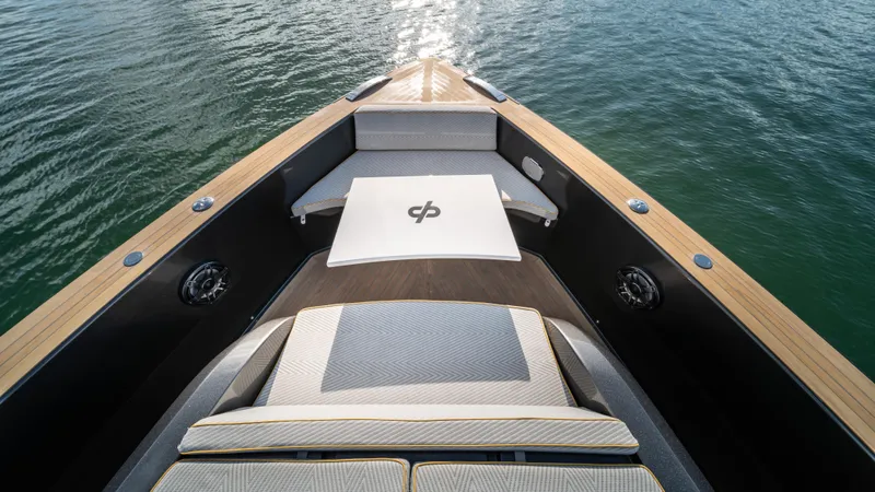 Love$ick Yacht Photos Pics 2023 Pardo Yachts P50 bow with luxurious seating and elegant design on calm water.