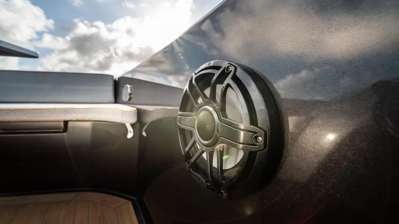 Love$ick Yacht Photos Pics Speaker on 2023 Pardo Yachts P50, with sleek design and sunny sky background.