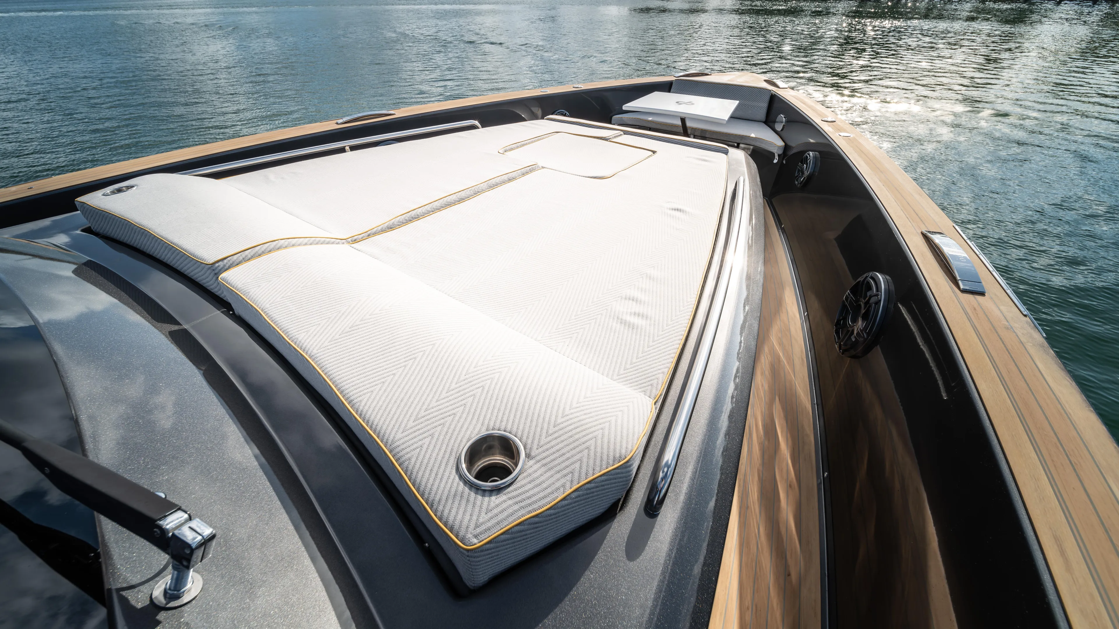 Love$ick Yacht Photos Pics 2023 Pardo Yachts P50 deck with luxurious sunbathing area on calm water.