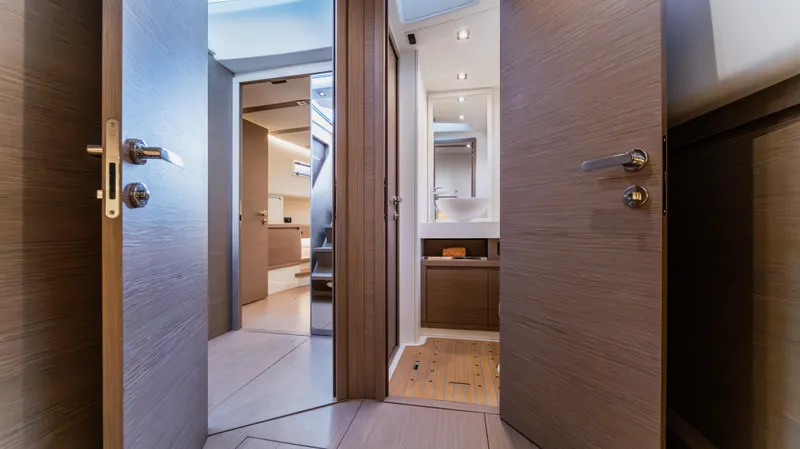 Love$ick Yacht Photos Pics Interior of 2023 Pardo Yachts P50, featuring modern wood finishes and sleek design.