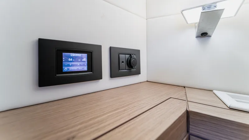 Love$ick Yacht Photos Pics Control panel and light switch on 2023 Pardo Yachts P50 interior.