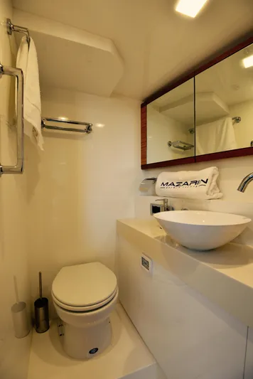  Yacht Photos Pics Luxurious bathroom in 2017 Mazarin 72 Cruiser/Racer yacht with modern fixtures and elegant design.