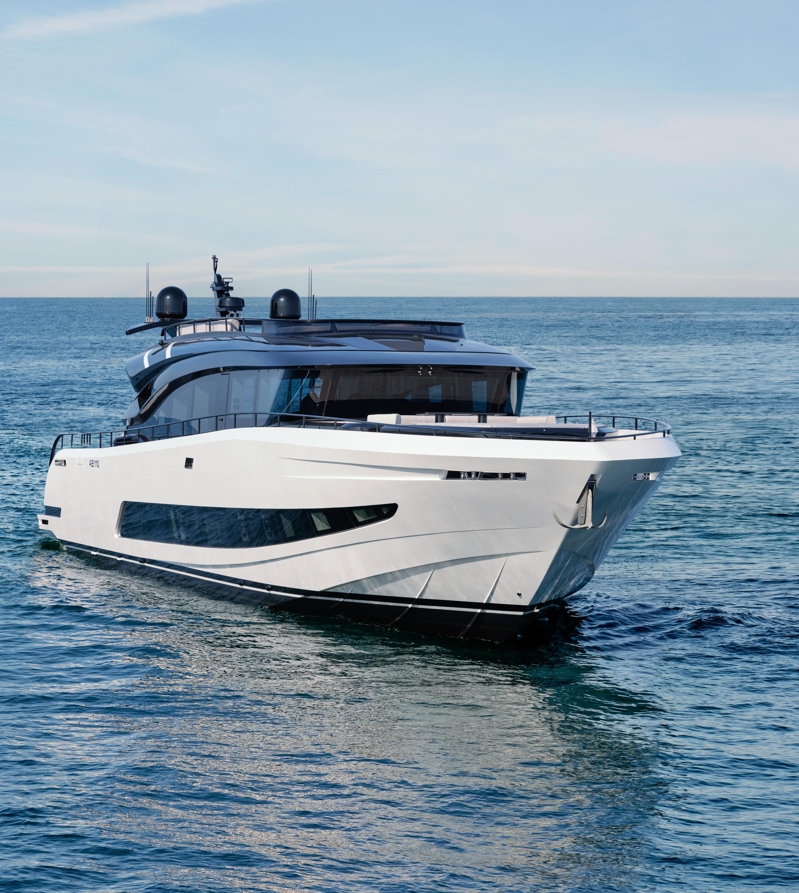 Luxurious 2025 AB 110 yacht cruising on open sea under clear skies.