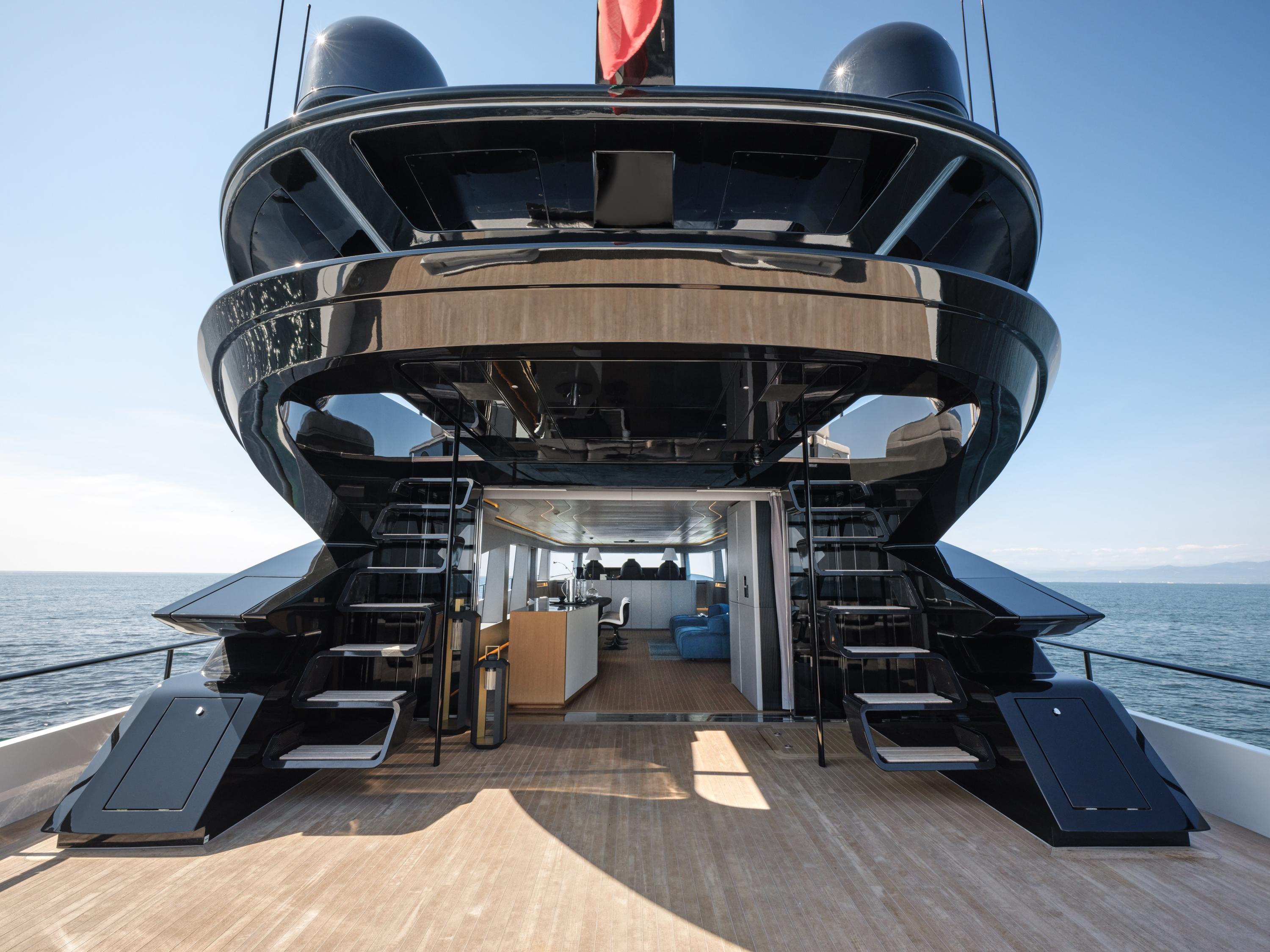 Luxurious AB 110 yacht deck with modern design, 2025 model, overlooking the ocean.