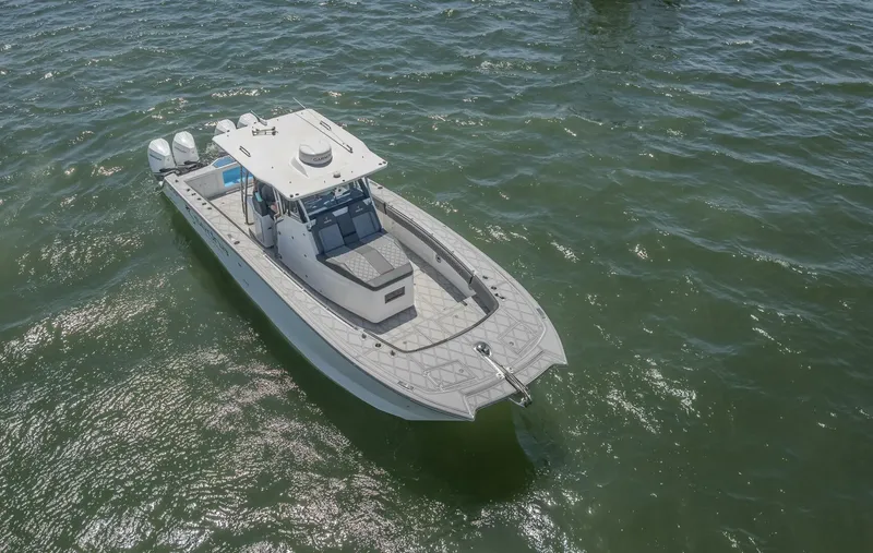  Yacht Photos Pics 2025 Sedna 37 Open boat on water, aerial view, showcasing sleek design and twin engines.