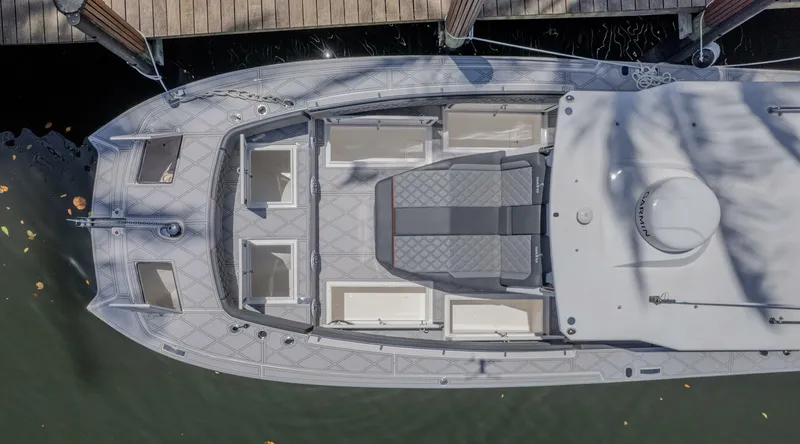  Yacht Photos Pics Aerial view of 2025 Sedna 37 Open yacht docked, showcasing spacious deck layout.
