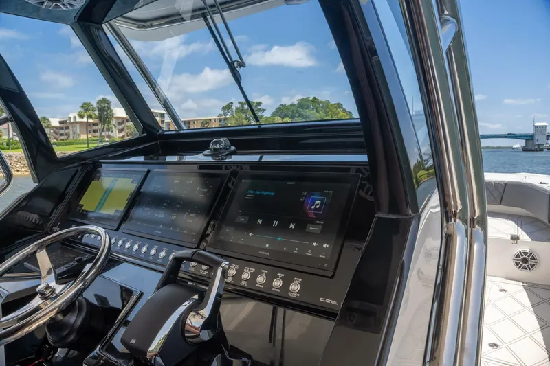  Yacht Photos Pics Helm of 2025 Sedna 37 Open boat with advanced navigation displays.