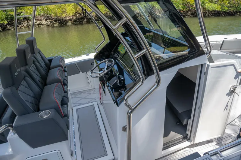  Yacht Photos Pics 2025 Sedna 37 Open boat interior with modern helm and seating.