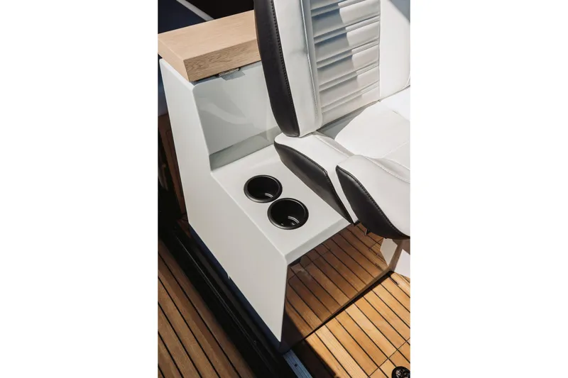  Yacht Photos Pics Luxury seating and cup holders on 2026 XO Boats EXPLR 44 with teak flooring.