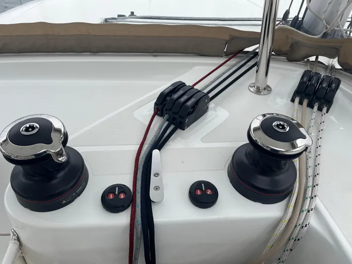 Hullchal Yacht Photos Pics Sailing equipment on a 2021 Lagoon 42 catamaran deck, featuring winches and ropes.