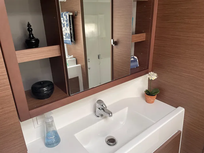 Hullchal Yacht Photos Pics Modern bathroom sink with mirror cabinet in 2021 Lagoon 42 yacht.