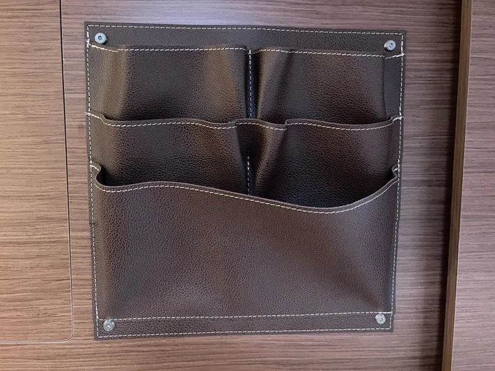 Hullchal Yacht Photos Pics Brown leather wall organizer on Lagoon 42 yacht, 2021 model.