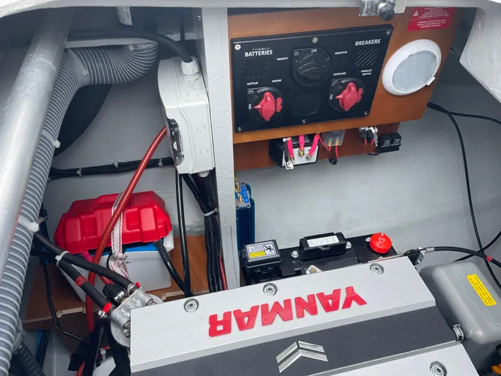 Hullchal Yacht Photos Pics Engine compartment of a 2021 Lagoon 42 with Yanmar engine and battery controls.