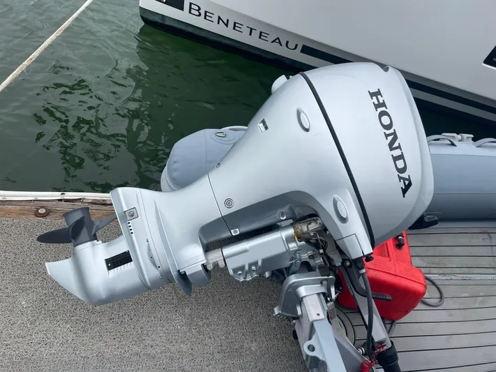 Hullchal Yacht Photos Pics Honda outboard motor on dock near Lagoon 42 catamaran, 2021 model.