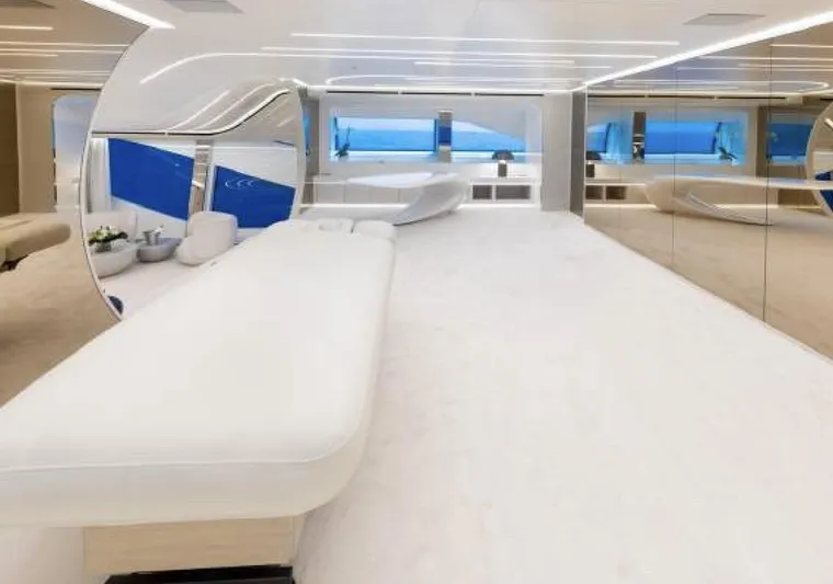 N1 Yacht Photos Pics Luxurious interior of 2022 Mangusta 165 REV yacht with modern design and panoramic windows.