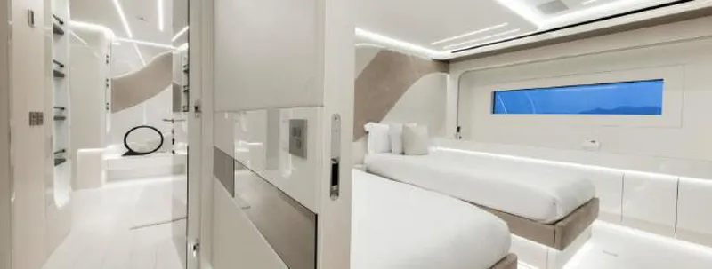 N1 Yacht Photos Pics Luxurious interior of 2022 Mangusta 165 REV yacht with modern design and elegant furnishings.