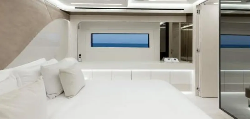 N1 Yacht Photos Pics Luxurious interior of 2022 Mangusta 165 REV yacht, featuring modern design and ocean view.