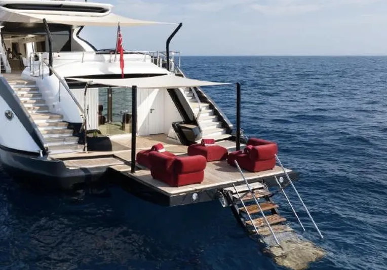 N1 Yacht Photos Pics Luxury 2022 Mangusta 165 REV yacht with elegant deck and ocean view.