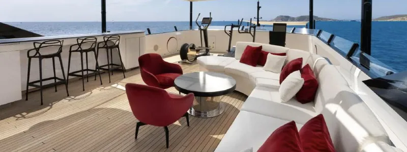 N1 Yacht Photos Pics Luxurious deck of 2022 Mangusta 165 REV yacht with elegant seating and ocean view.
