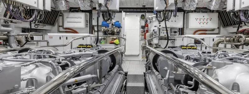 N1 Yacht Photos Pics Engine room of 2022 Mangusta 165 REV yacht, showcasing advanced machinery and equipment.