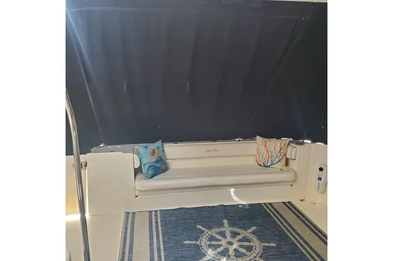  Yacht Photos Pics 2007 Sea Ray 580 Sedan Bridge interior with nautical-themed decor and cushions.