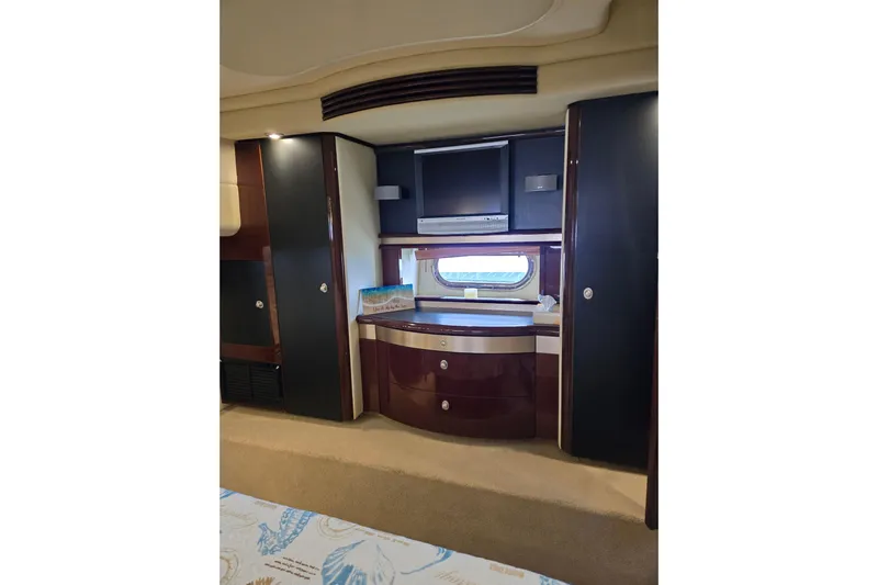  Yacht Photos Pics Luxurious interior of 2007 Sea Ray 580 Sedan Bridge yacht with elegant cabinetry and window view.