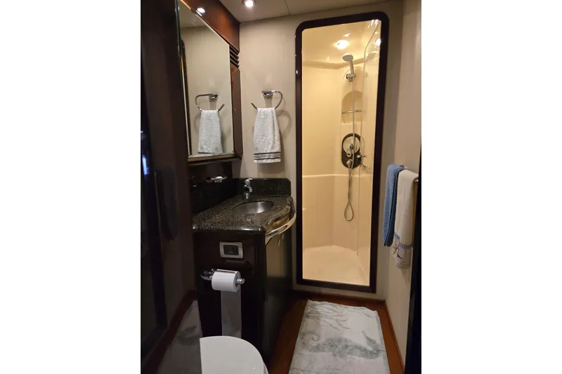  Yacht Photos Pics Luxurious bathroom in 2007 Sea Ray 580 Sedan Bridge yacht with shower and sink.