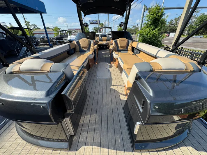  Yacht Photos Pics Luxurious 2025 Avalon Excalibur 27' boat interior with spacious seating and sleek design.