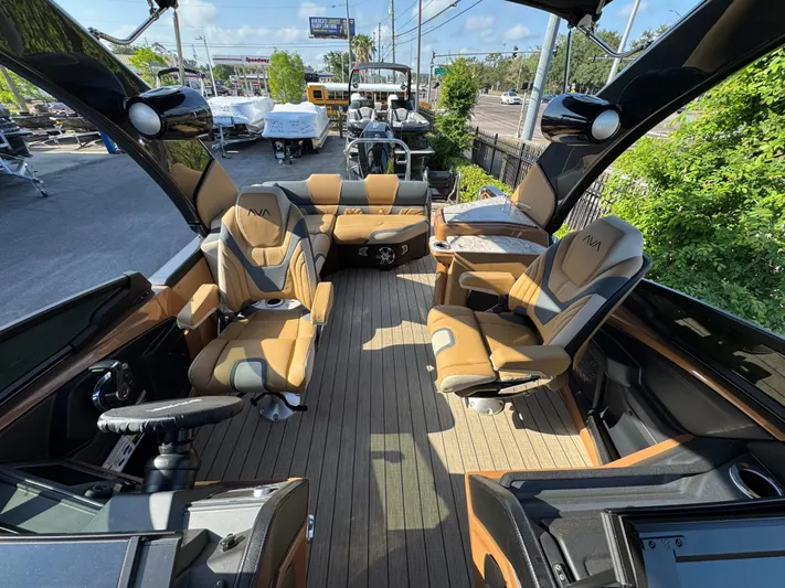  Yacht Photos Pics Luxurious 2025 Avalon Excalibur 27' boat interior with plush seating and sleek design.