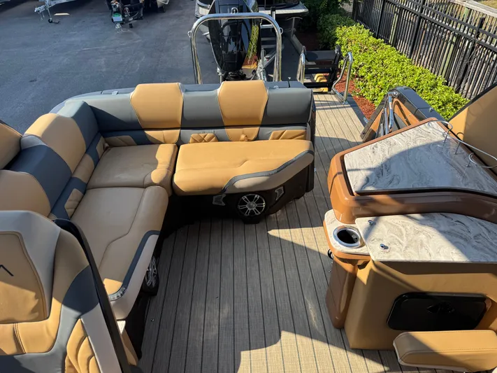  Yacht Photos Pics Luxurious 2025 Avalon Excalibur 27' boat interior with plush seating and modern amenities.