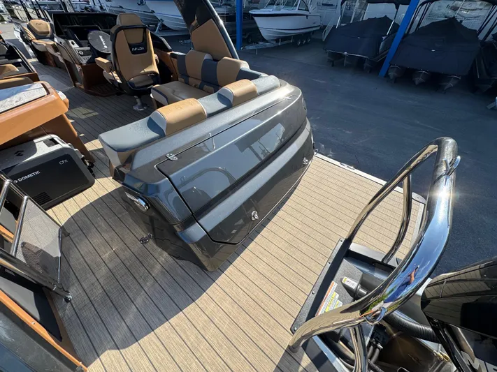  Yacht Photos Pics 2025 Avalon Excalibur 27' boat interior with luxurious seating and modern design.