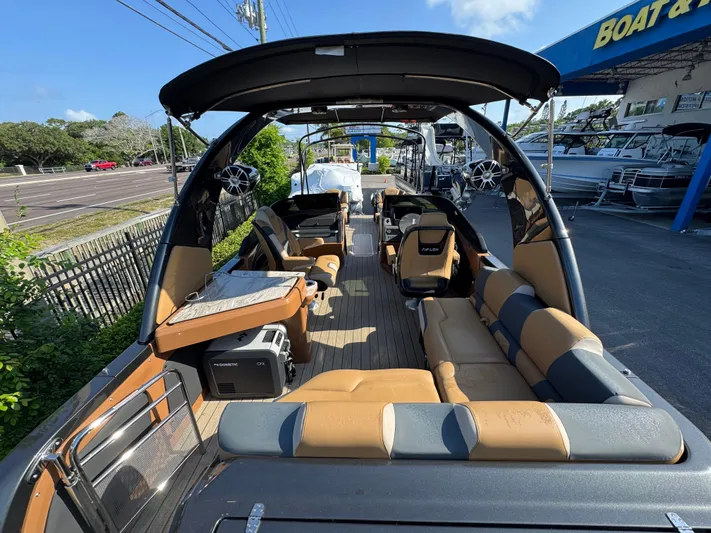  Yacht Photos Pics Luxurious 2025 Avalon Excalibur 27' boat interior with spacious seating and modern amenities.