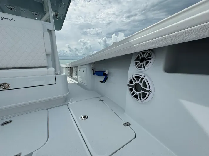  Yacht Photos Pics 2025 Yellowfin 32 boat interior with speakers and storage compartments.