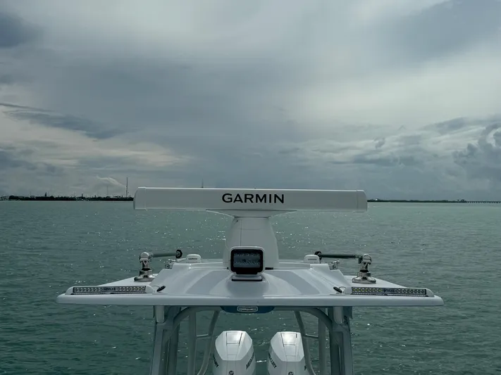  Yacht Photos Pics 2025 Yellowfin 32 boat with Garmin radar on open water.