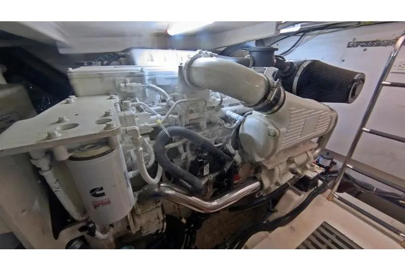  Yacht Photos Pics Engine room of 2005 Tiara Yachts 3600 Sovran, showcasing detailed machinery components.