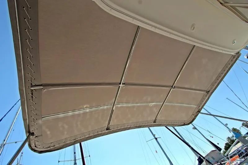  Yacht Photos Pics 2005 Tiara Yachts 3600 Sovran canvas top with marina background.