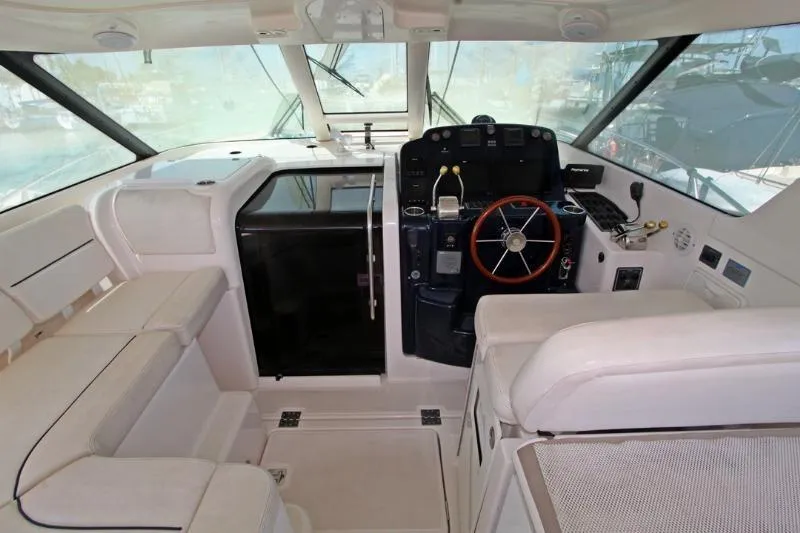  Yacht Photos Pics 2005 Tiara Yachts 3600 Sovran helm with seating and steering wheel.