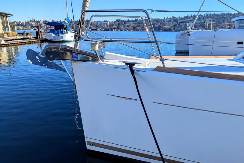 Windwaker Yacht Photos Pics Jeanneau 41 DS 2013 sailboat docked on a sunny day, calm waters.