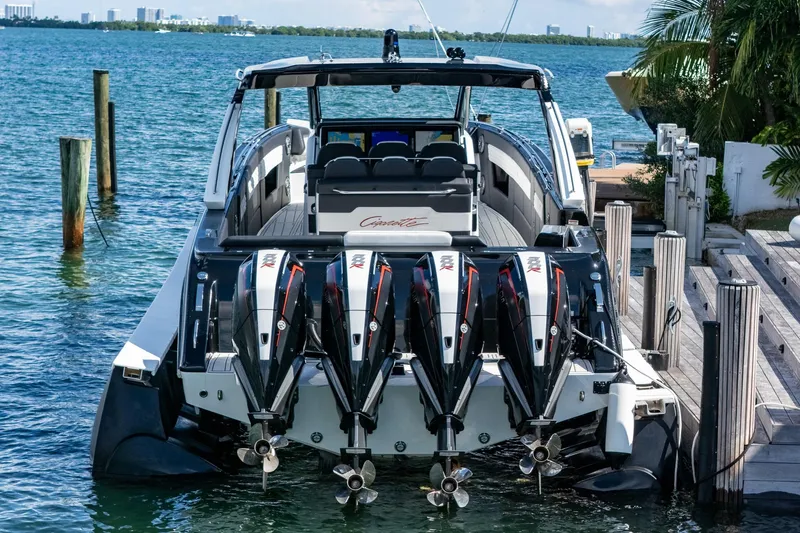 Yacht Photos Pics 2024 Cigarette 42 Auroris boat docked with four powerful outboard engines.