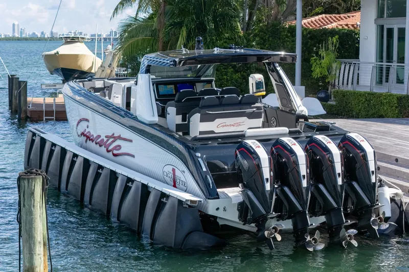  Yacht Photos Pics 2024 Cigarette 42 Auroris luxury boat docked with four powerful outboard engines.