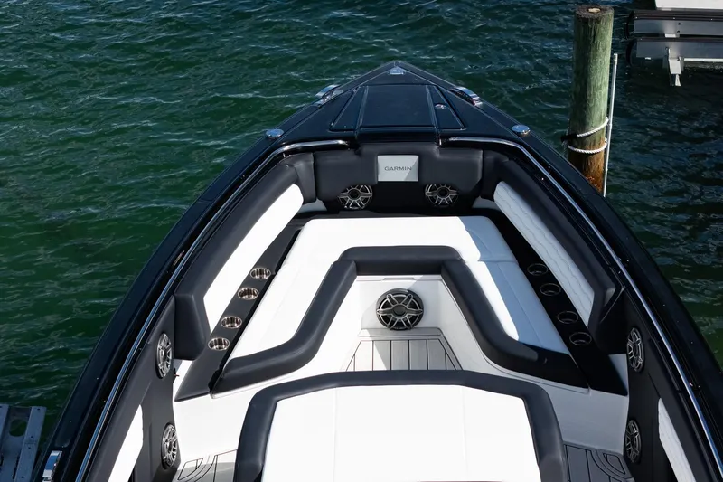  Yacht Photos Pics 2024 Cigarette 42 Auroris boat interior with luxurious seating and advanced audio system.