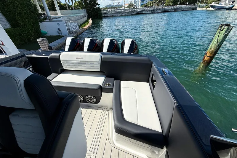  Yacht Photos Pics 2024 Cigarette 42 Auroris boat interior with luxurious seating and powerful outboard engines.