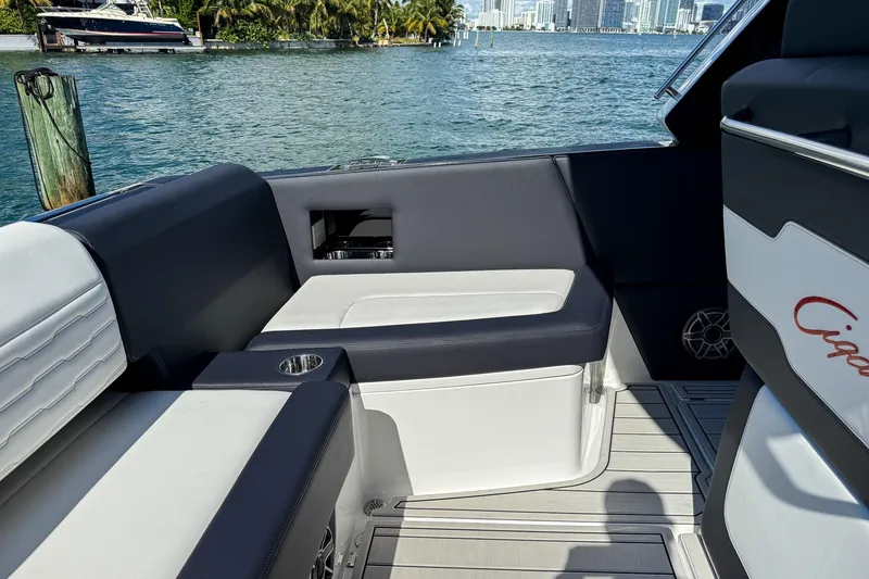  Yacht Photos Pics Luxurious seating on 2024 Cigarette 42 Auroris boat, with waterfront view.