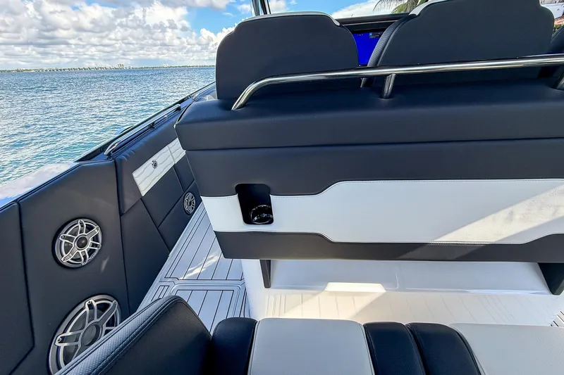  Yacht Photos Pics 2024 Cigarette 42 Auroris boat interior with sleek seating and ocean view.