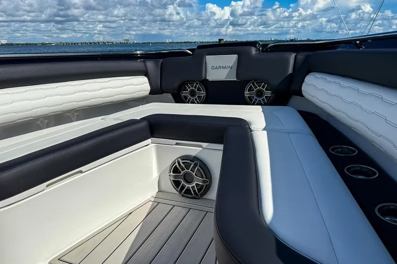  Yacht Photos Pics 2024 Cigarette 42 Auroris boat interior with luxury seating and marine speakers.