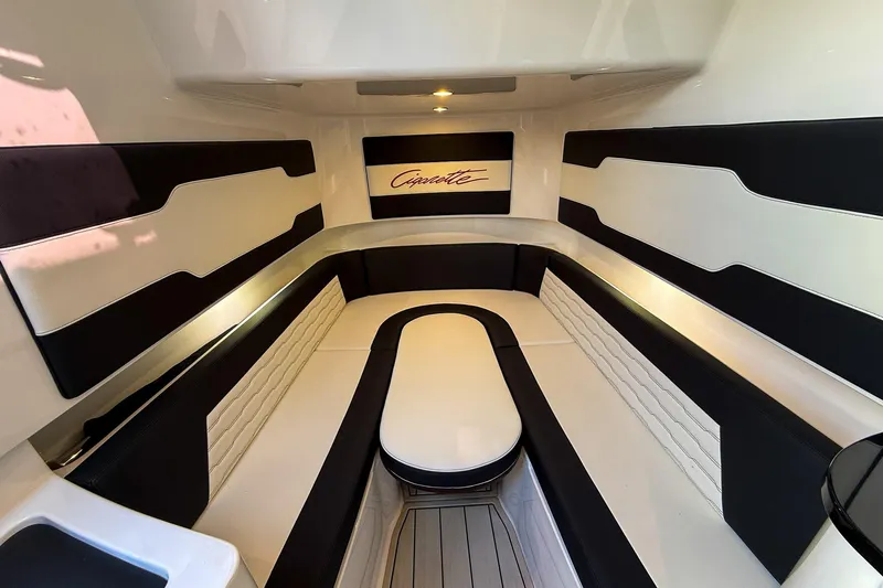  Yacht Photos Pics 2024 Cigarette 42 Auroris interior with sleek black and white seating design.